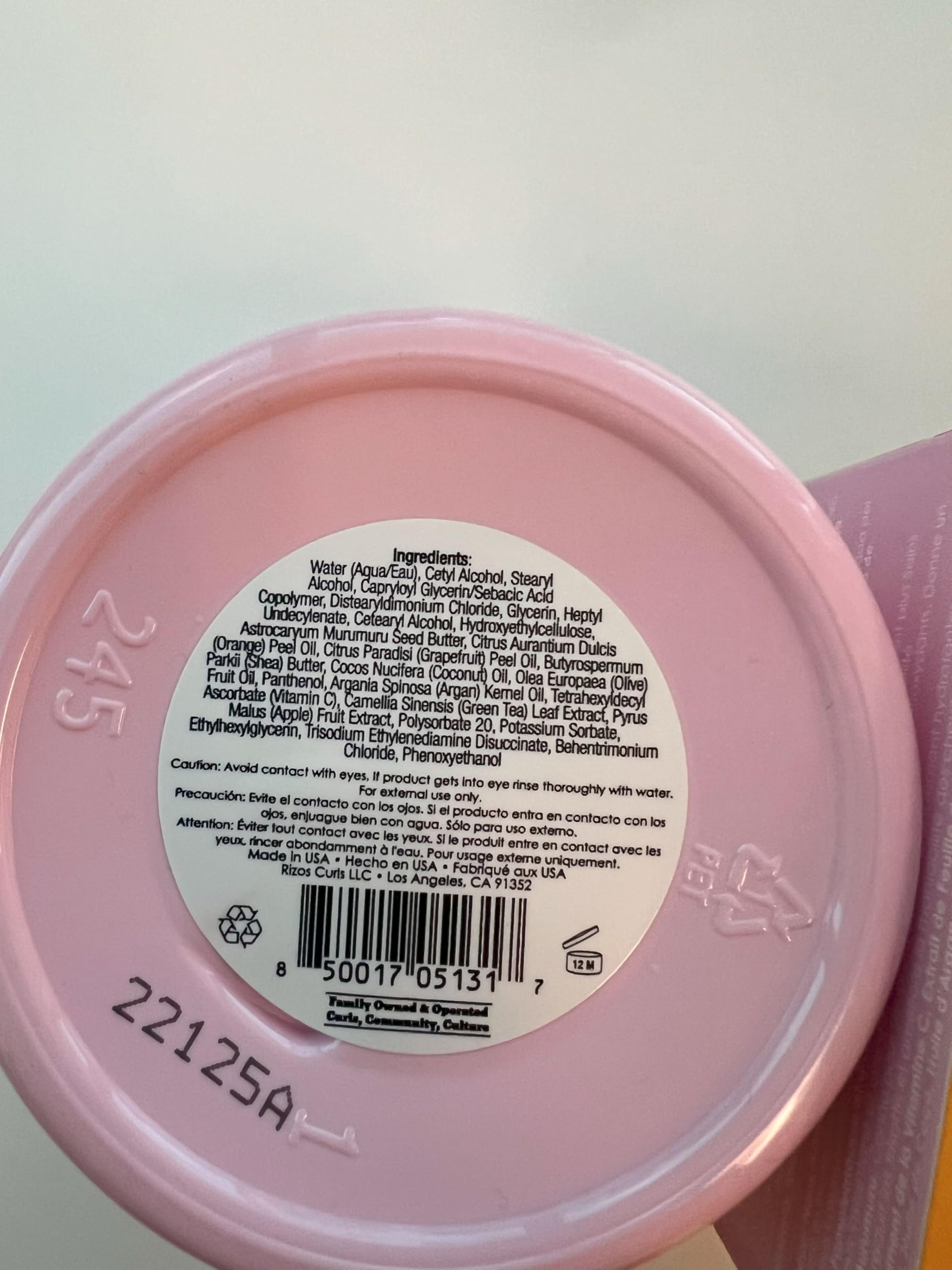 Rizos Curls Vitamin C Hair Repair Mask label highlights grapefruit and orange oil nourishment