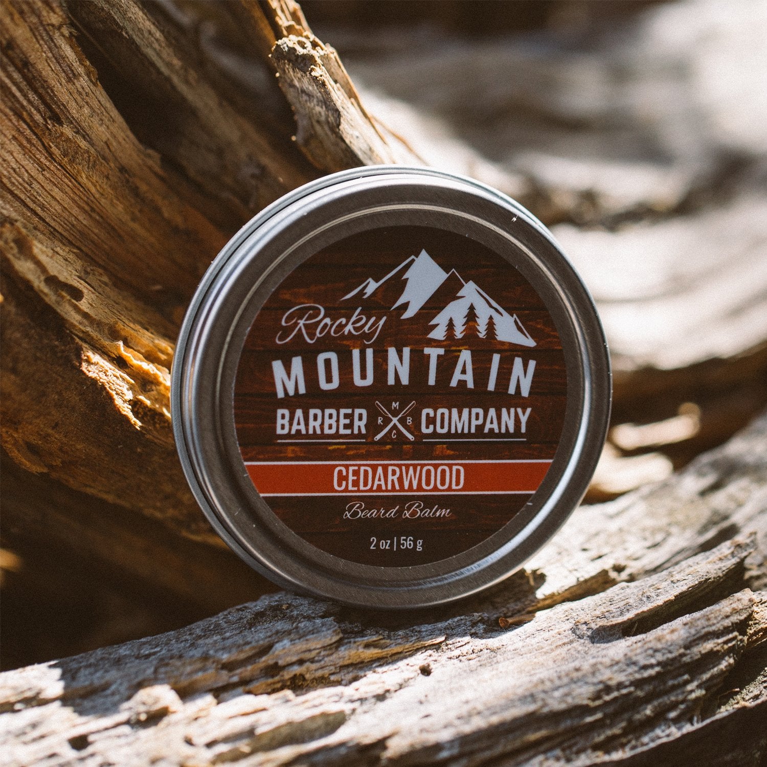 Rocky Mountain Barber Company Beard Balm with real cedarwood oil for authentic aroma.
