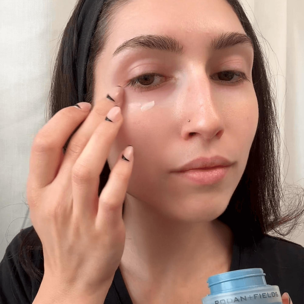 RODAN + FIELDS ReDefine Eye Cream application demonstrates gentle patting around the orbital bone.