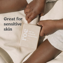 Roe Wellness baby sunscreen on arm during application for delicate-skin use.