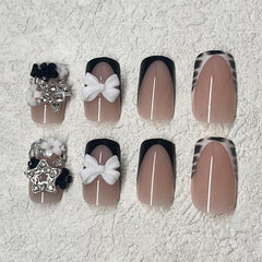 ROFIBUT short square nails with glossy finish for everyday wear.