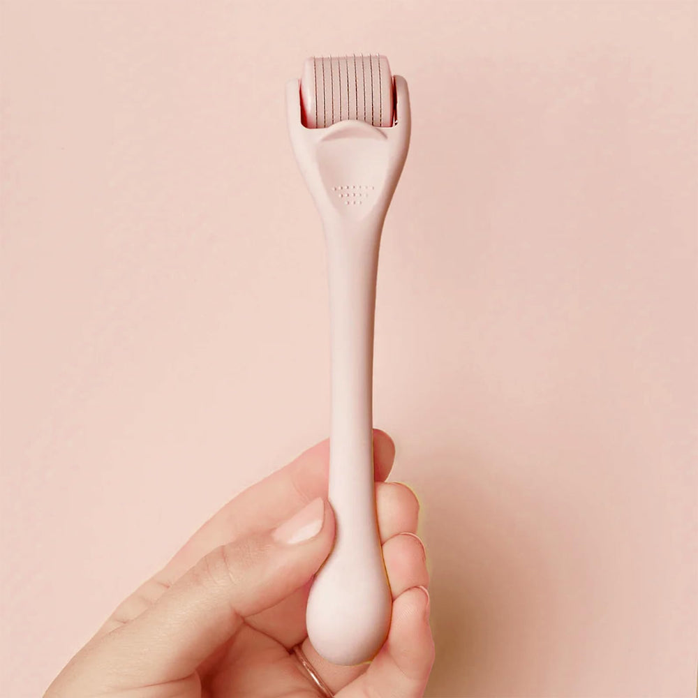 ROSELYNBOUTIQUE Derma Roller for scalp use, supports gentle hairline grooming at home.