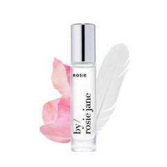 Rosie perfume oil bottle showing travel-friendly packaging for on-the-go fragrance.