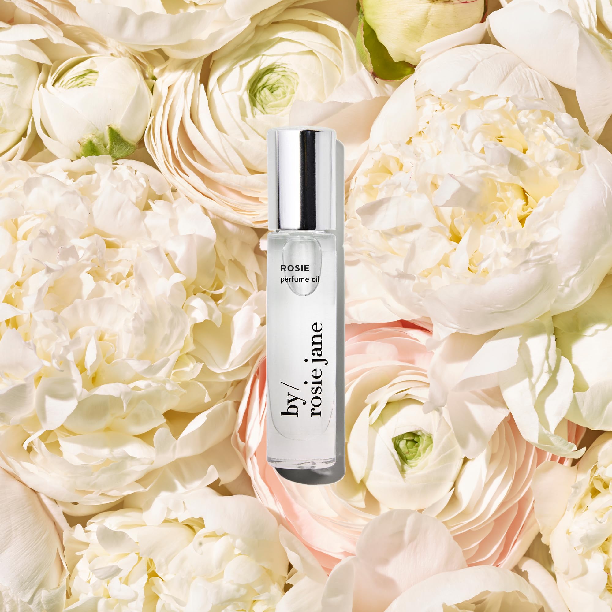 Rosie perfume oil rose note close-up emphasizing floral aroma.