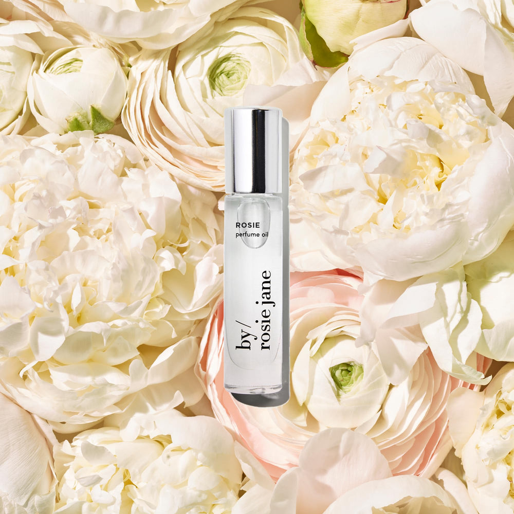 Rosie perfume oil rose note close-up emphasizing floral aroma.