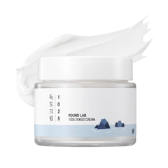 Crema ROUND LAB Dokdo en botella: hidratación suave para uso diario.