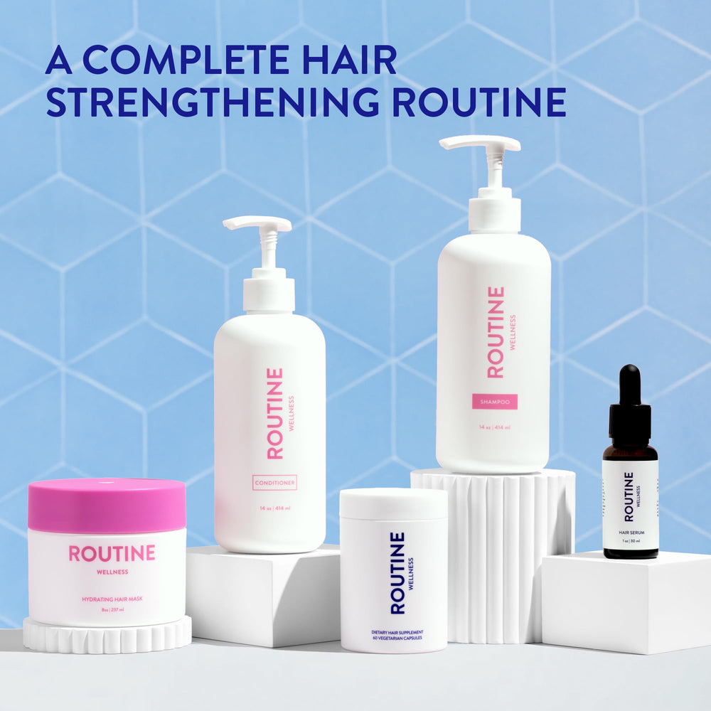 Routine Wellness Color-Safe Shampoo on sink with towels.