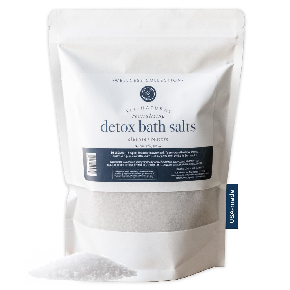 Rowe Casa Organics Detox Bath Salts bottle highlights magnesium-rich blend for relaxed muscles.