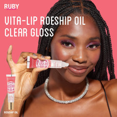 Ruby Kisses Broadway Vita-Lip Gloss con aceite de rosa mosqueta suaviza labios.