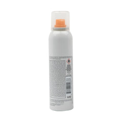 RUSK Thermal Shine Spray aplicándose en seco para acabado suave