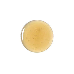 Espuma densa de Ryo Champú durante lavado de cabello fino.