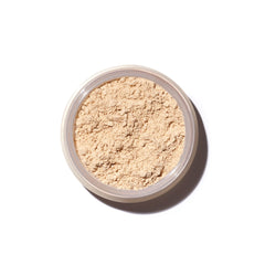 Saie Airset Radiant Loose Powder tin close-up showing weightless translucent finish