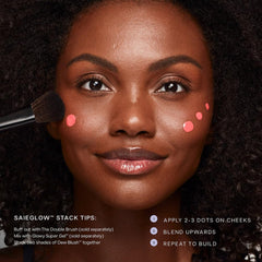 Saie Dew Blush Spicy swatch hints at a deeper flush for evenings.