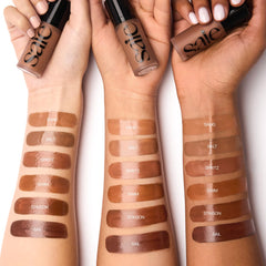 Saie Dew Bronze highlights with Licorice Root for radiant glow.