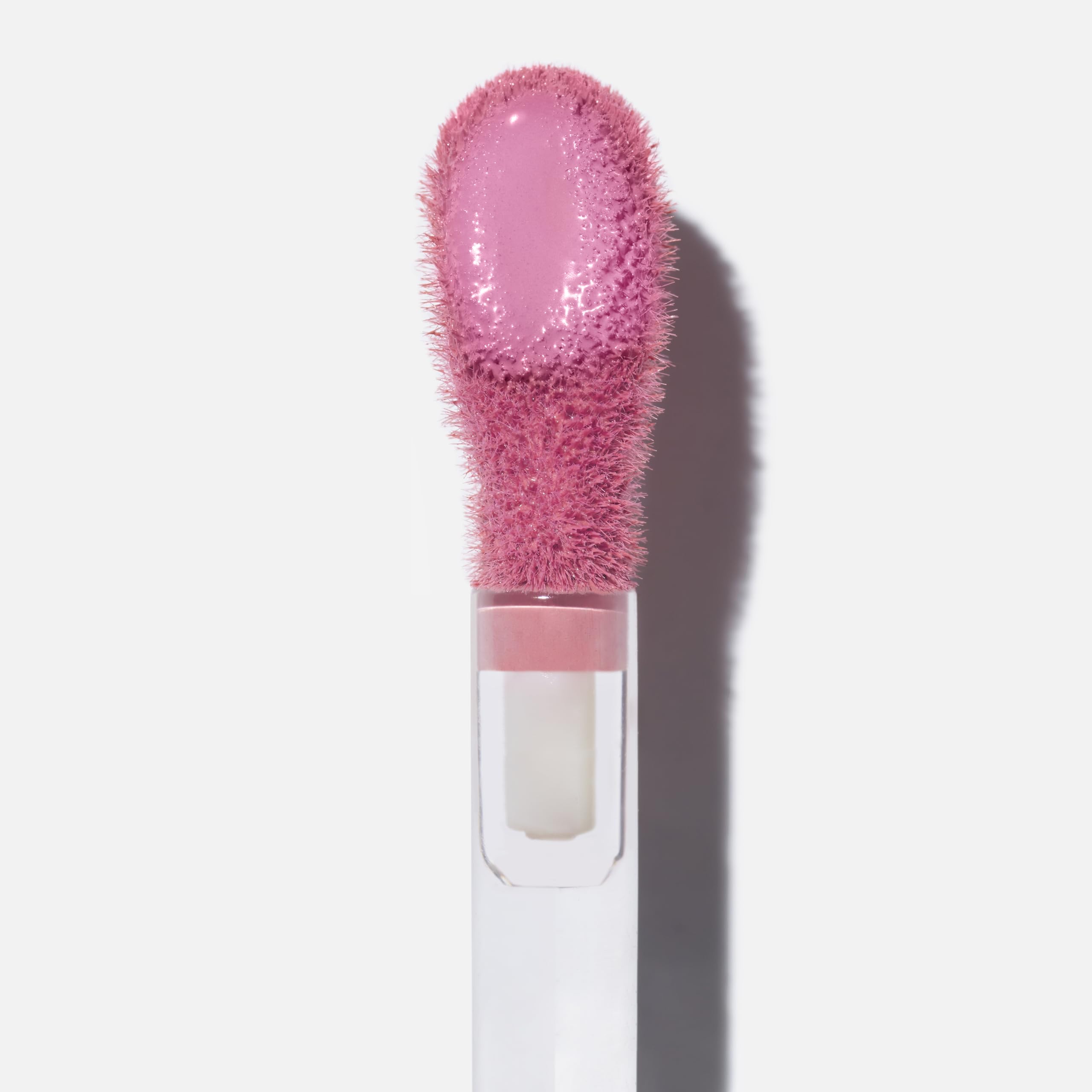 Saie Dew Liquid Blush blended on cheeks for dewy finish