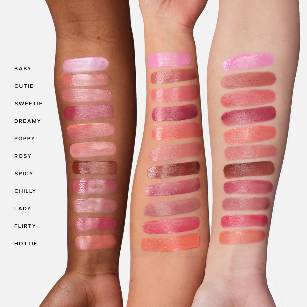 Saie Dew Liquid Blush swatch on apples of cheeks showing dewy finish.