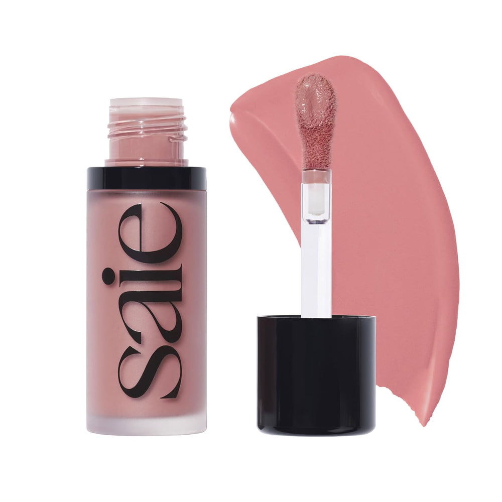 Saie Dew Liquid Blush packaging close-up highlighting vegan formula for travel.
