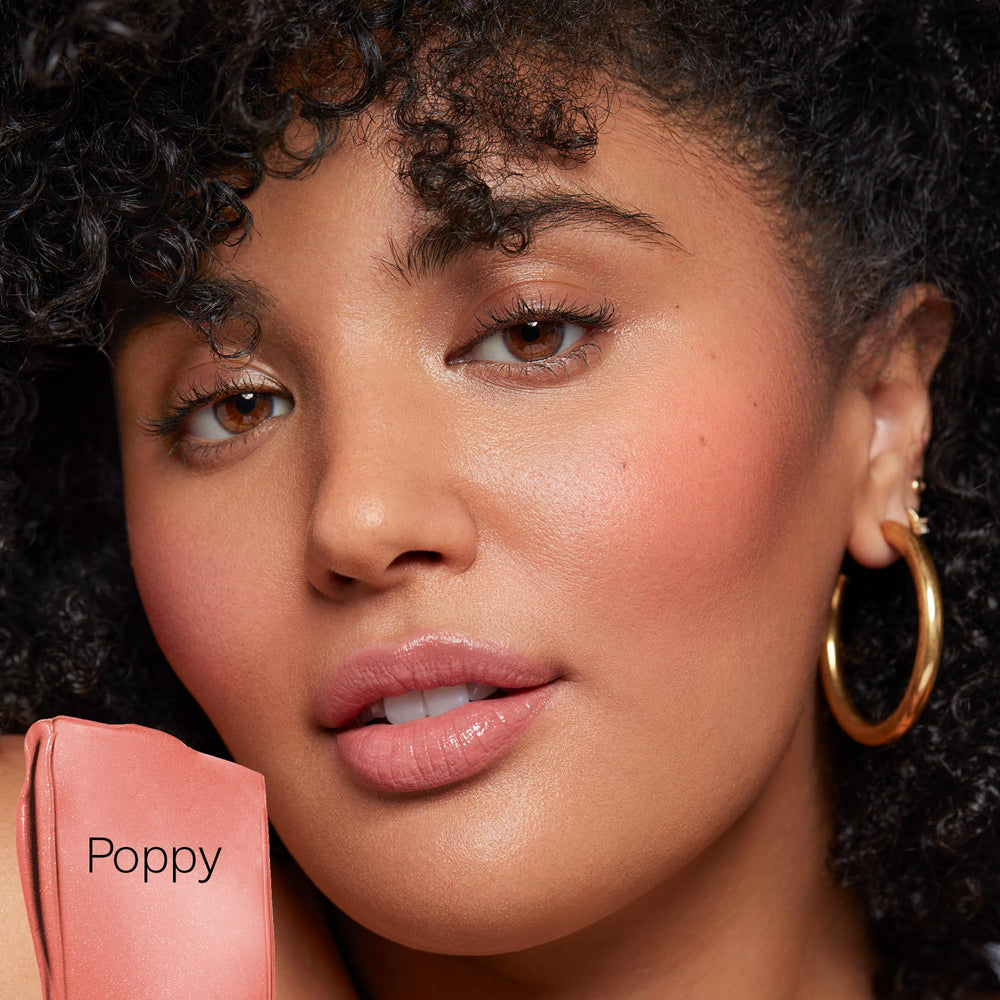 Saie Dew Liquid Blush Poppy packaging display in compact case.