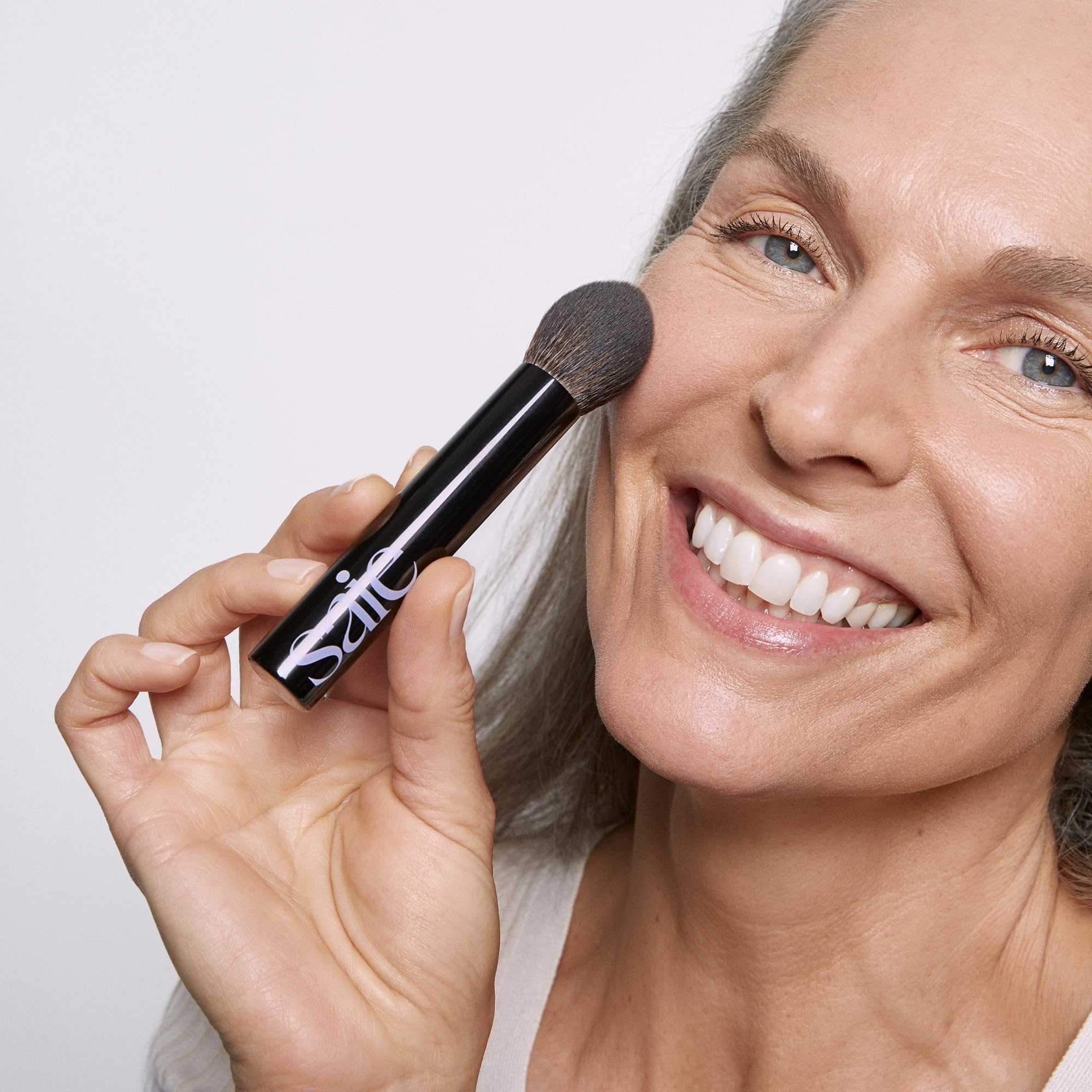 Saie The Fluffy Brush blends powders for a soft finish