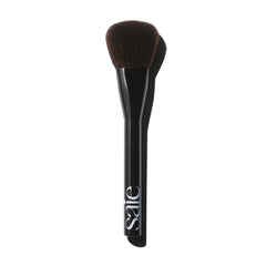 Saie Powder Blush Brush headshot showing fluffy bristles for diffused blush