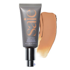 Saie Slip Tint bottle closeup showing SPF 35 protection for everyday wear.