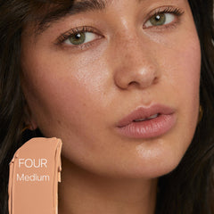 Shade Four Saie Slip Tint swatch on light-to-medium skin tone