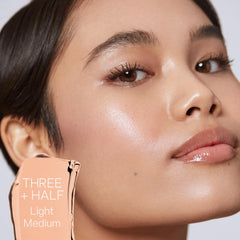 Saie Slip Tint glow finish on skin for a luminous look.