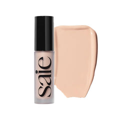Saie Slip Tint concealer bottle is portable and hydrating for on-the-go coverage.