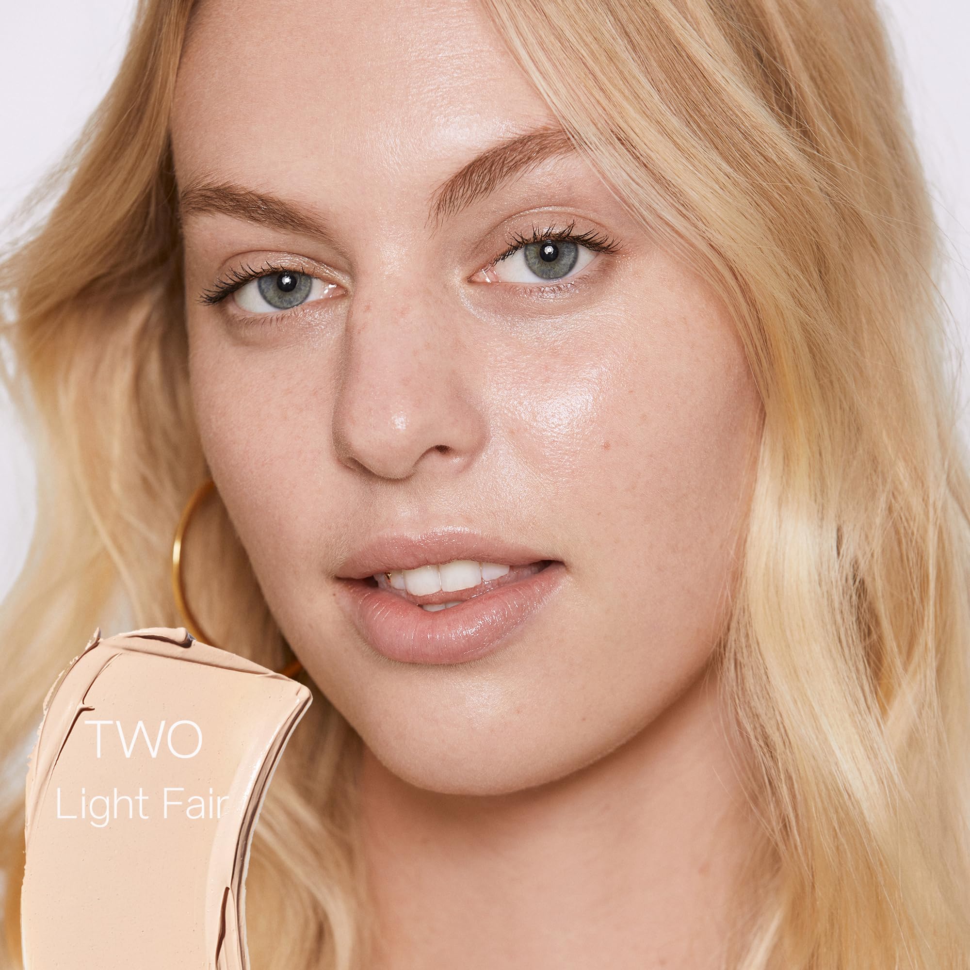 Saie Slip Tint swirl on cheek displaying lightweight texture and radiance