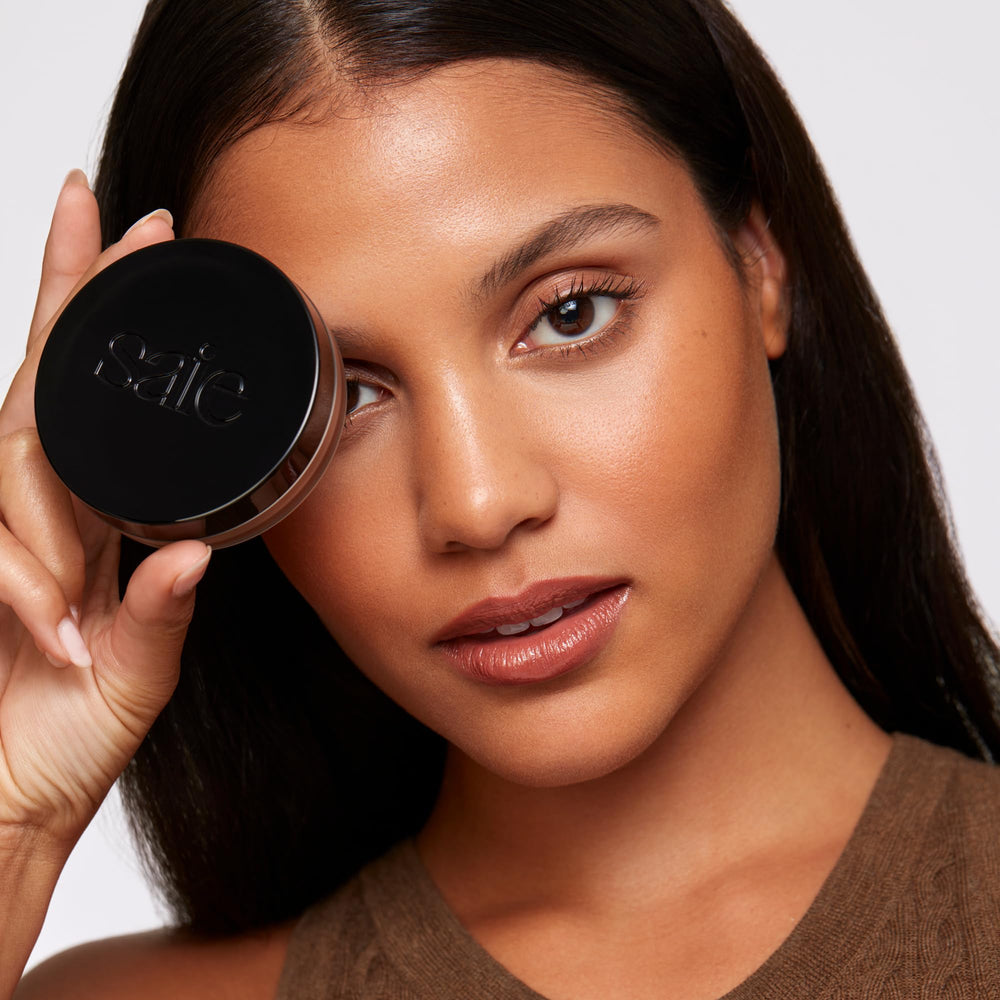 Saie Sun Melt natural bronze on the cheeks provides sun-kissed warmth