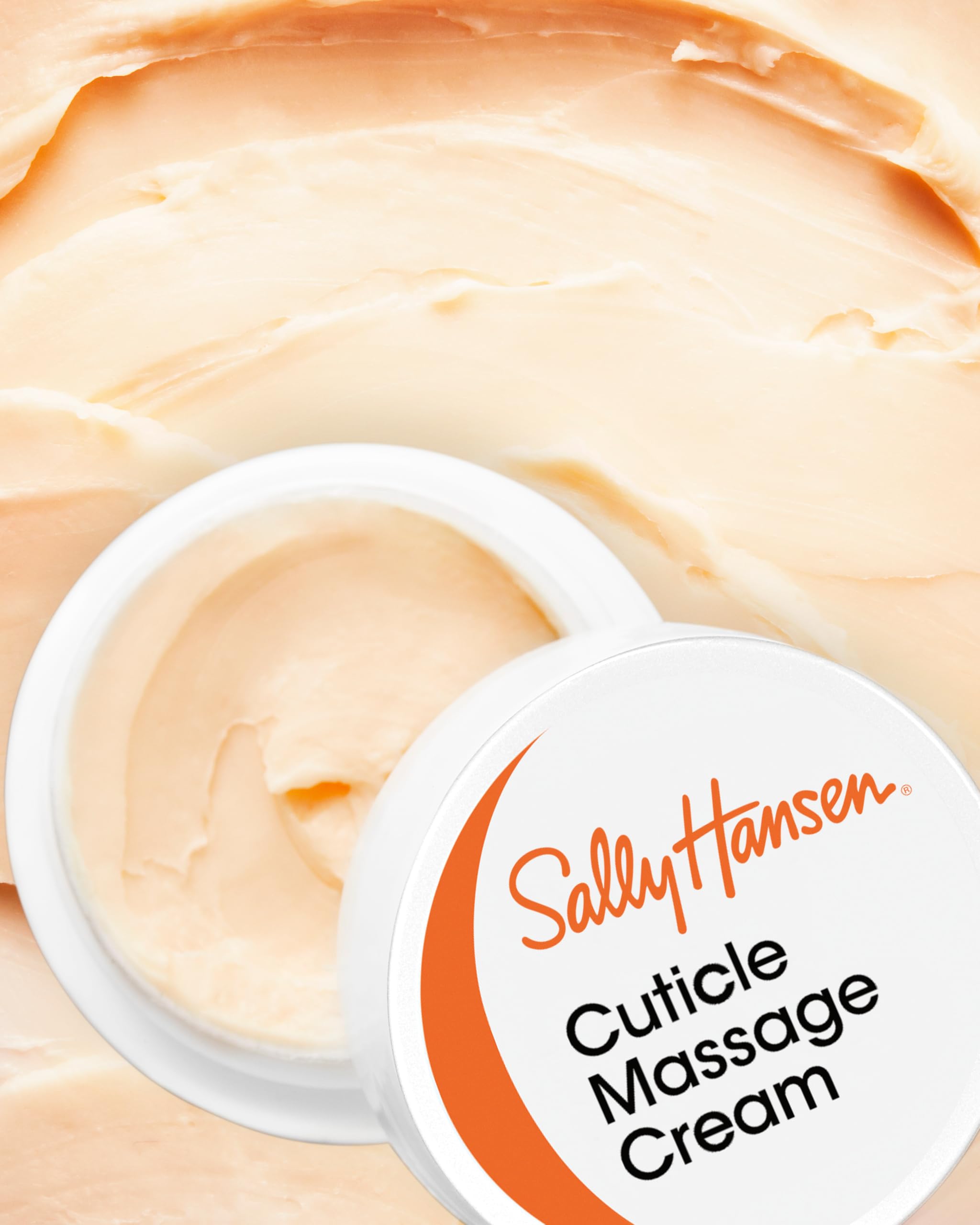 Close-up of applicator applying cream to cuticles for nourishment.