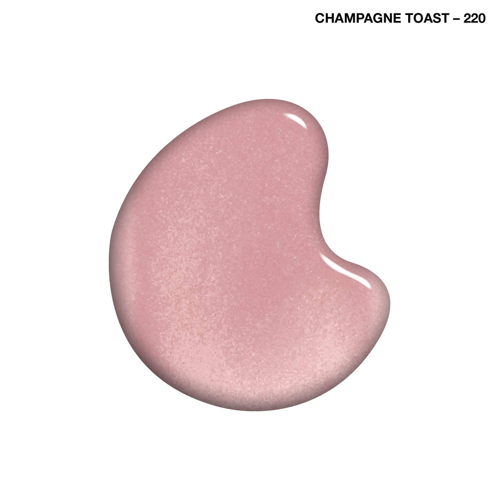 Nails closeup reveals sheer pink shimmer with diamond strength protection