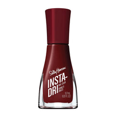 Esmalte Sally Hansen Insta-Dri en tono 398 Pomp Plum, color intenso y duradero.