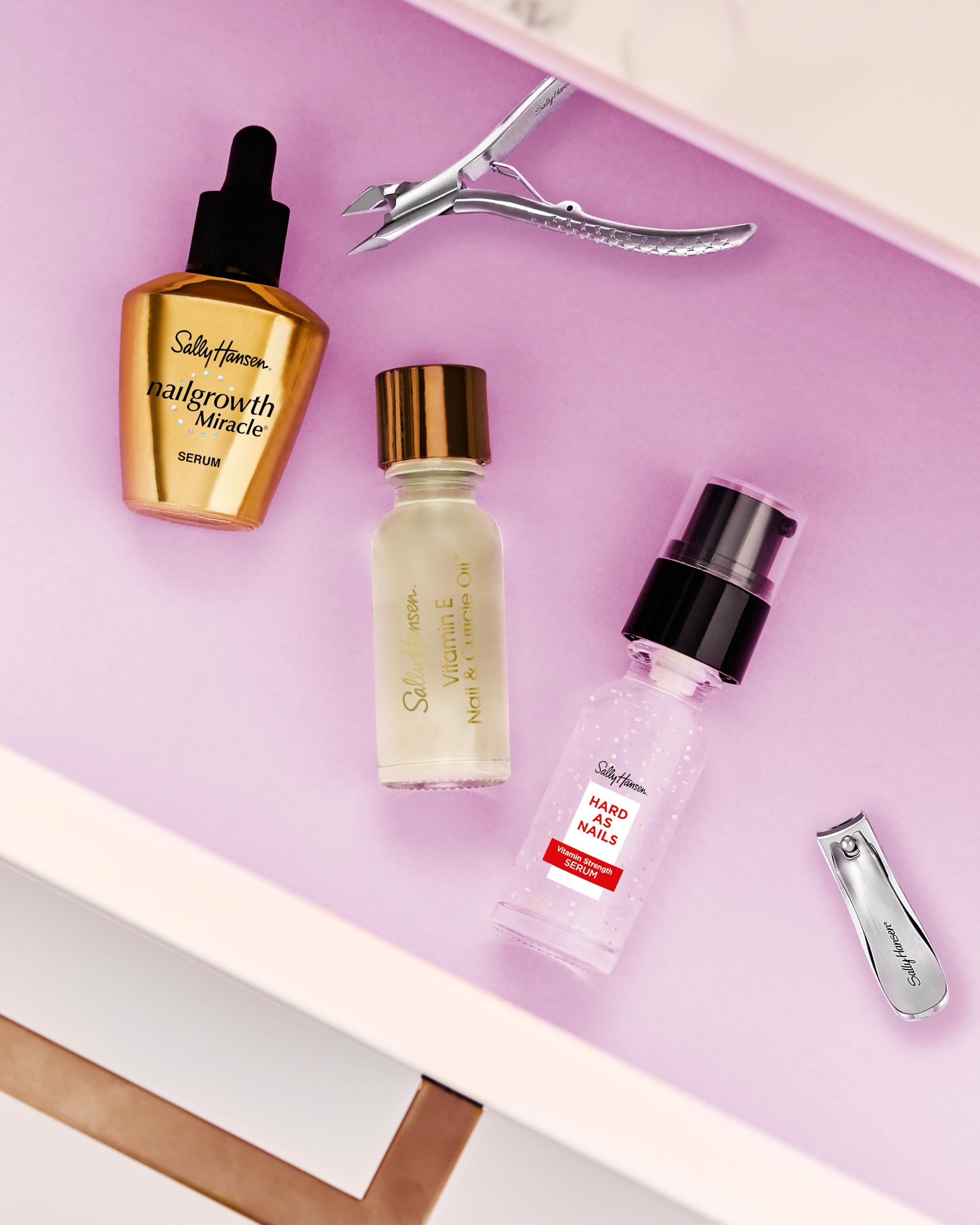 Sally Hansen Nail Oil applying on nail for cuticle conditioning