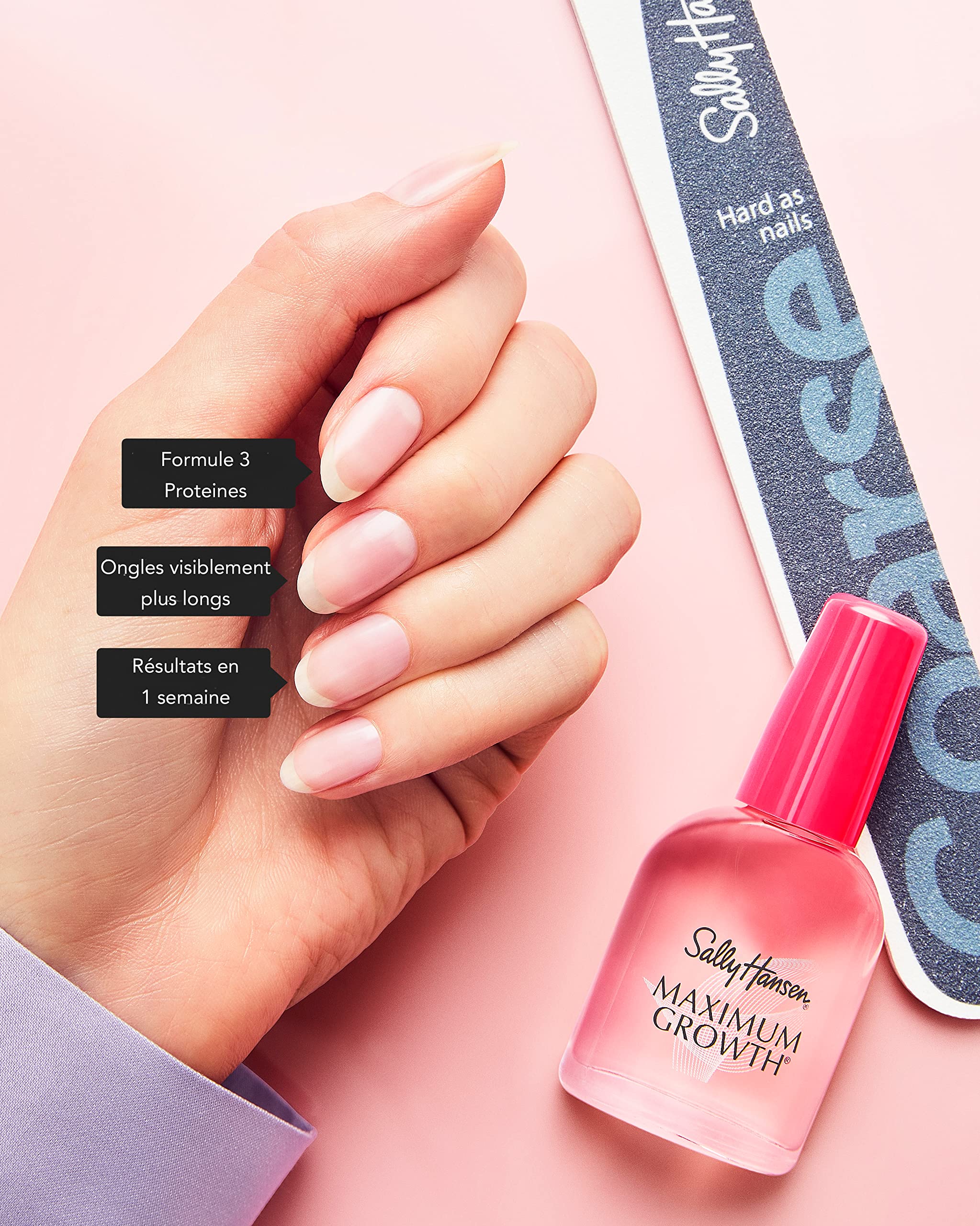 Sally Hansen nails on fingers close-up illustrate improved resilience and growth potential.