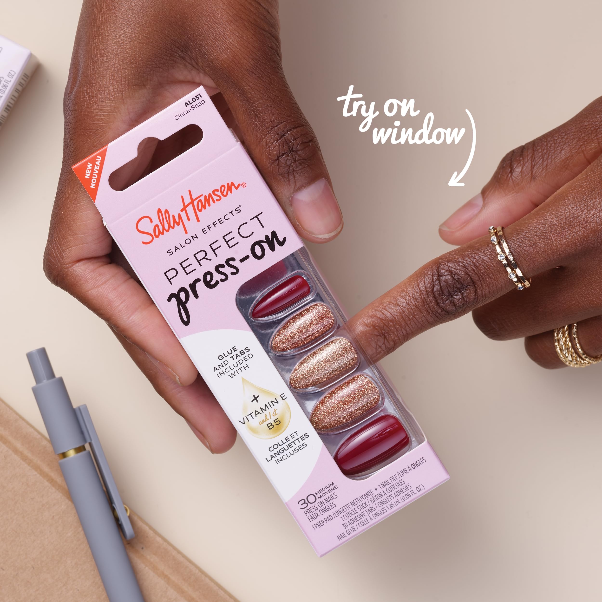 Sally Hansen Salon Effects home manicure kit includes glue, tabs, and file.