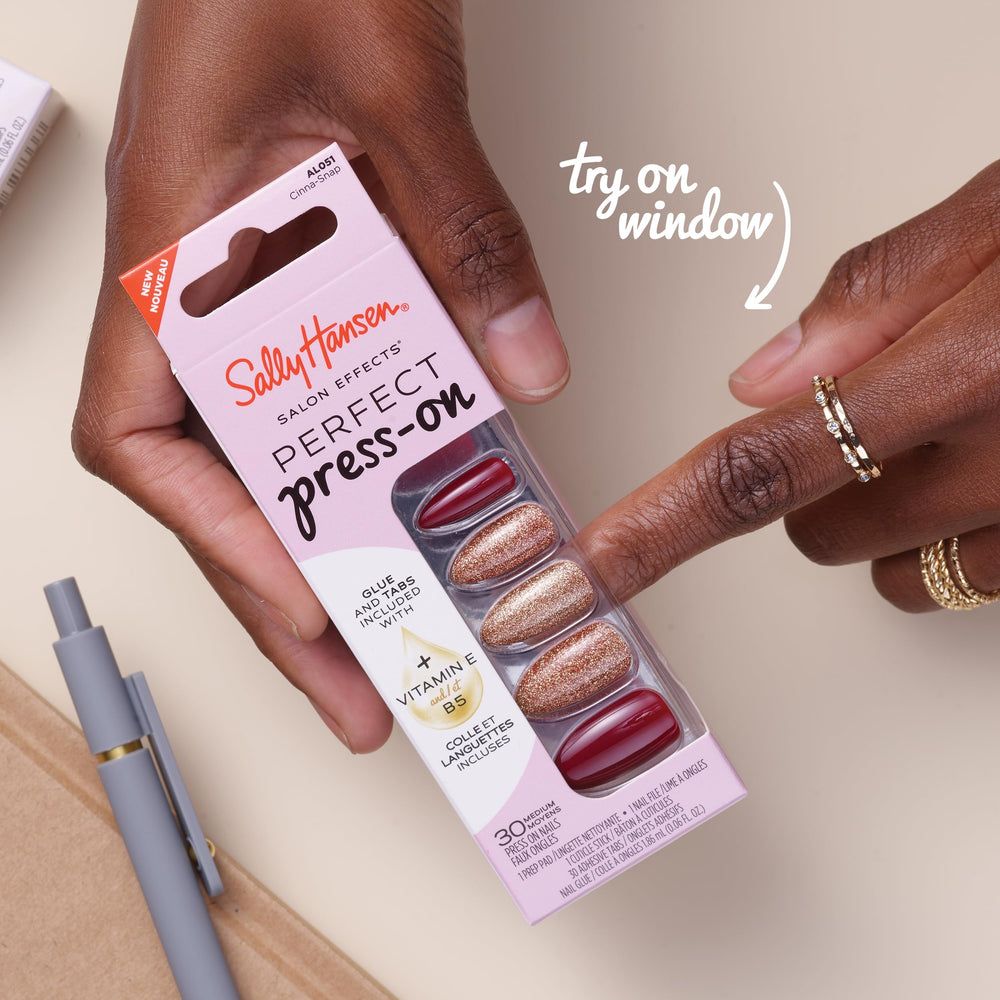 Sally Hansen Salon Effects home manicure kit includes glue, tabs, and file.