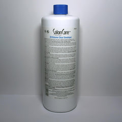 Cap and bottle of Salon Care 20 Volume Clear Developer in studio light.