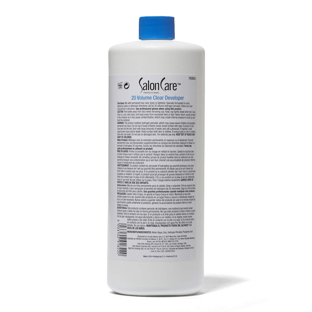 Pouring Salon Care 20 Volume Clear Developer for precise color application.