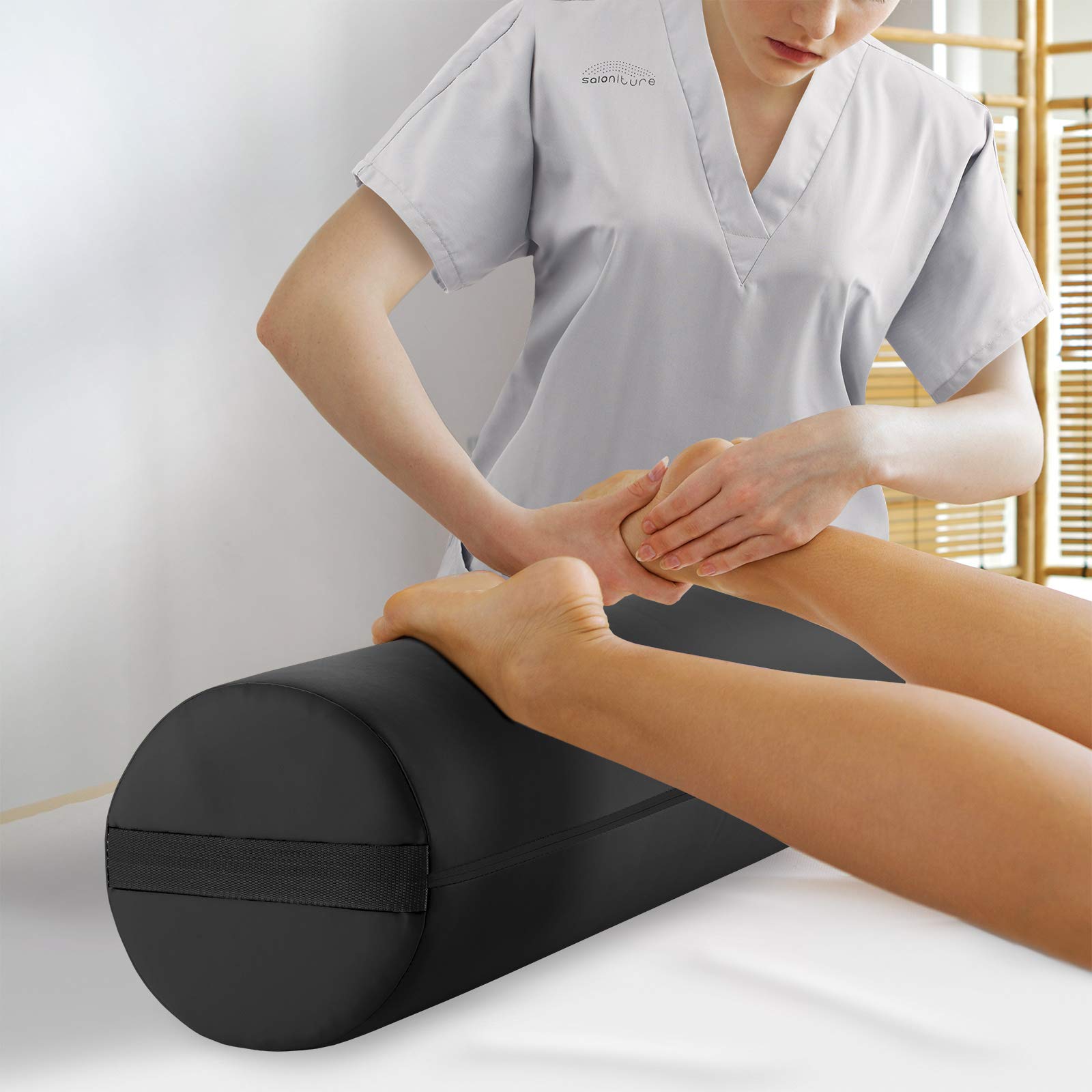 Saloniture jumbo round bolster oil-and-water-resistant cover protects upholstery.