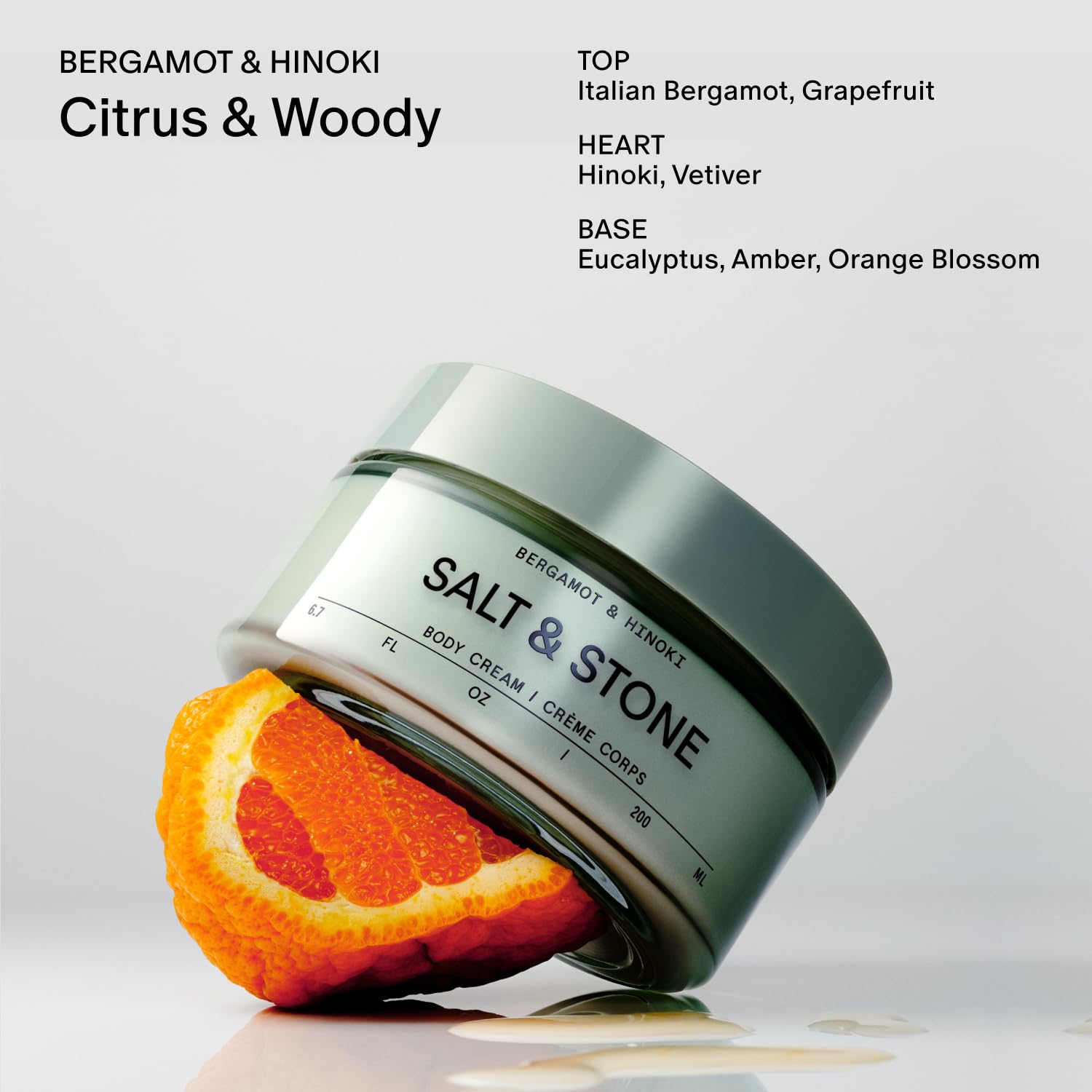 Salt & Stone Body Cream amber-bottle-on-desk presents premium packaging and everyday luxury
