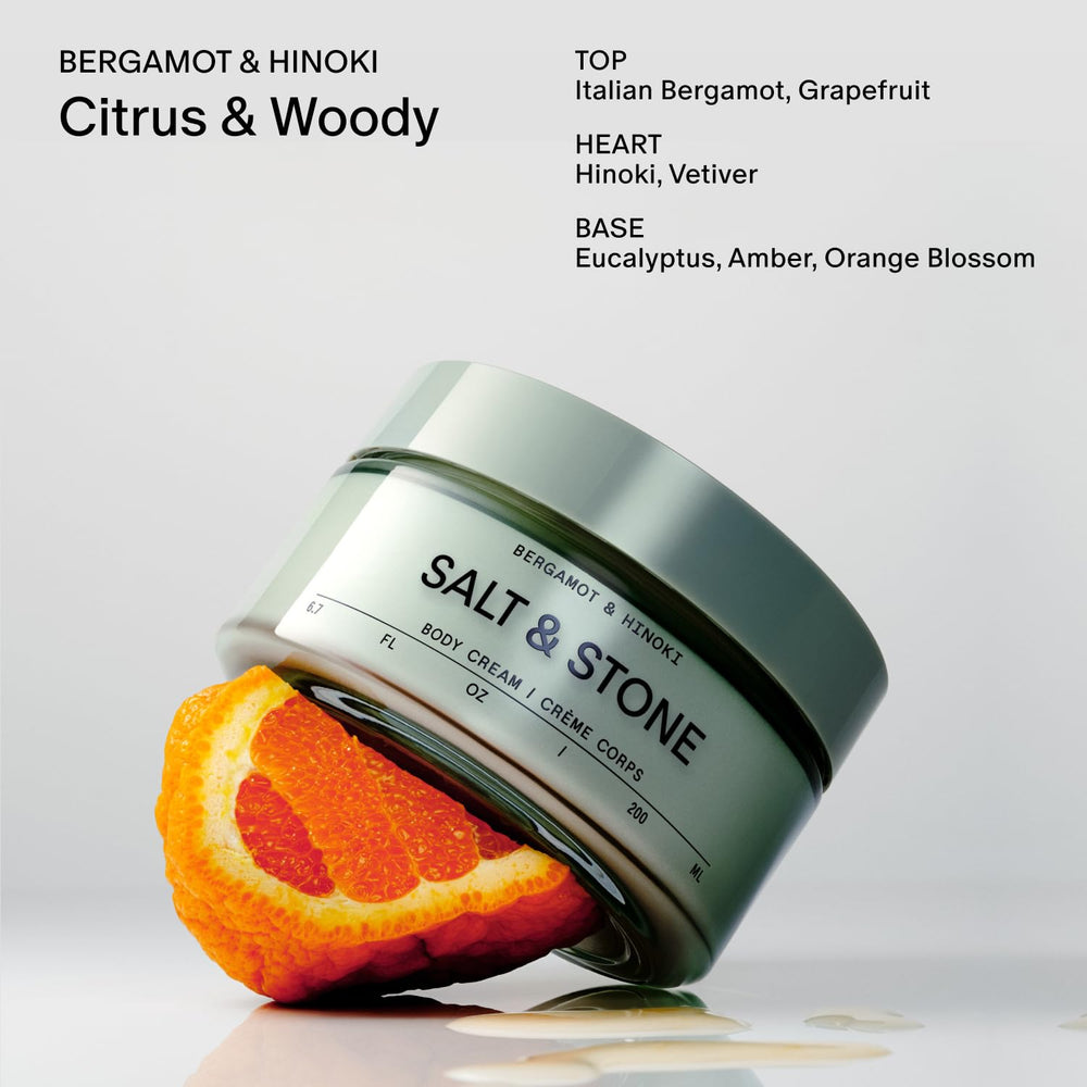 Salt & Stone Body Cream amber-bottle-on-desk presents premium packaging and everyday luxury