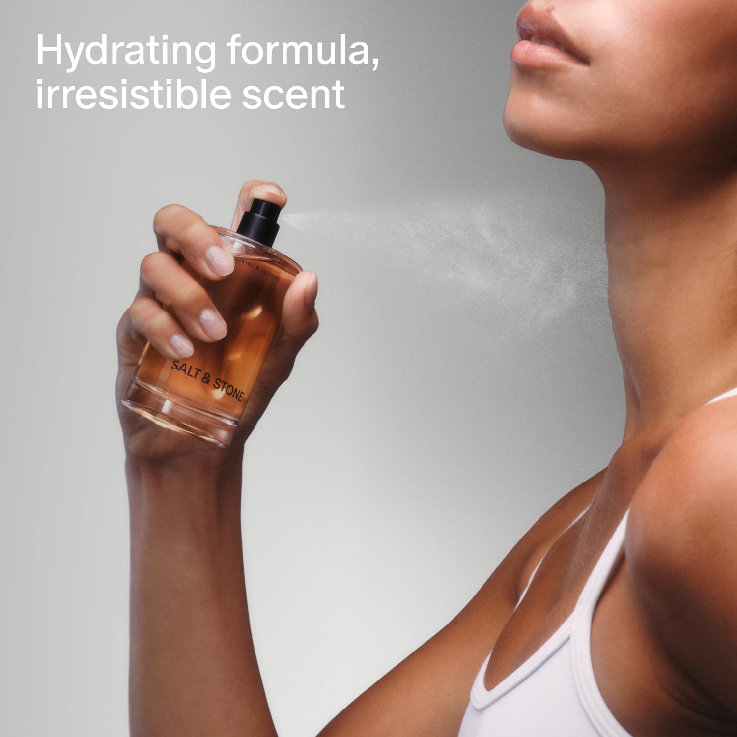 Salt & Stone Body Mist Santal & Vetiver spray bottle delivers a fresh, unisex aroma.