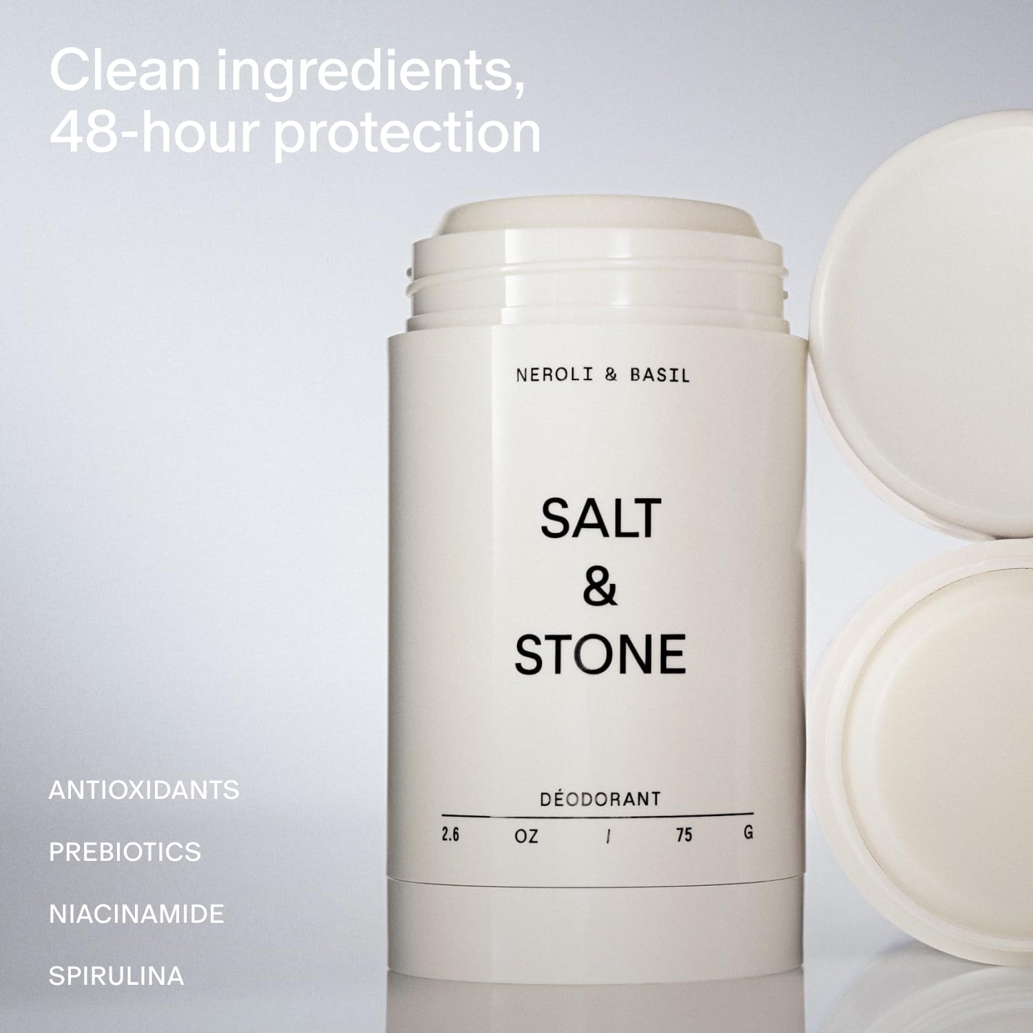 Salt & Stone aluminum-free deodorant stick in hand demonstrates easy glide.