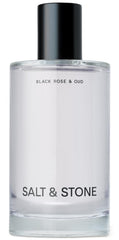 Salt & Stone Black Rose Oud bottle pour showing dark floral fragrance moment