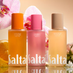 Saltair Aceite Corporal, aroma Playa Rosa, experiencia sensorial tropical.