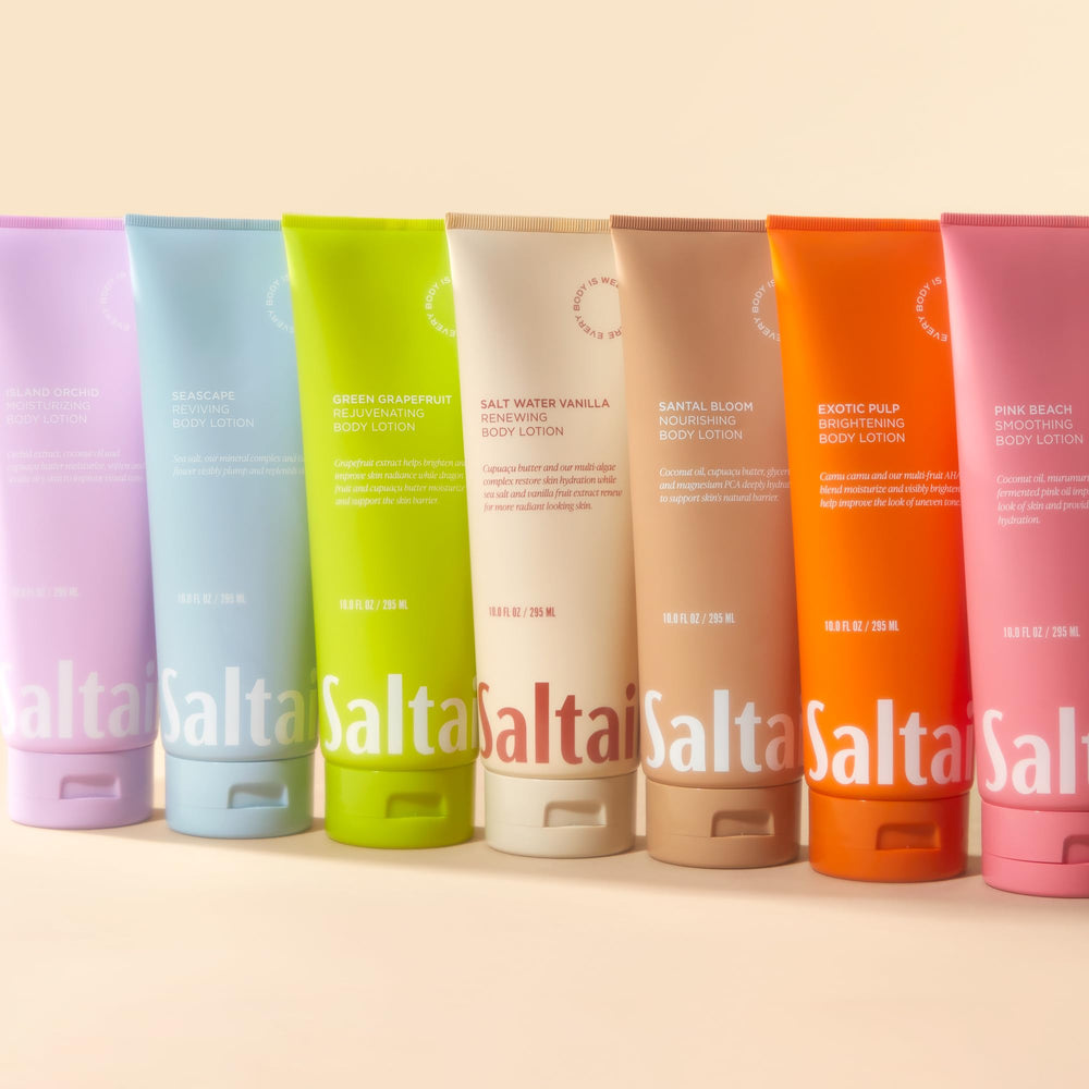 Hands applying Saltair Santal Bloom lotion for smooth, non-greasy feel.