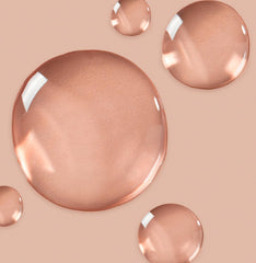 Saltair Body Oil Pink Beach texture close-up reveals silky finish.