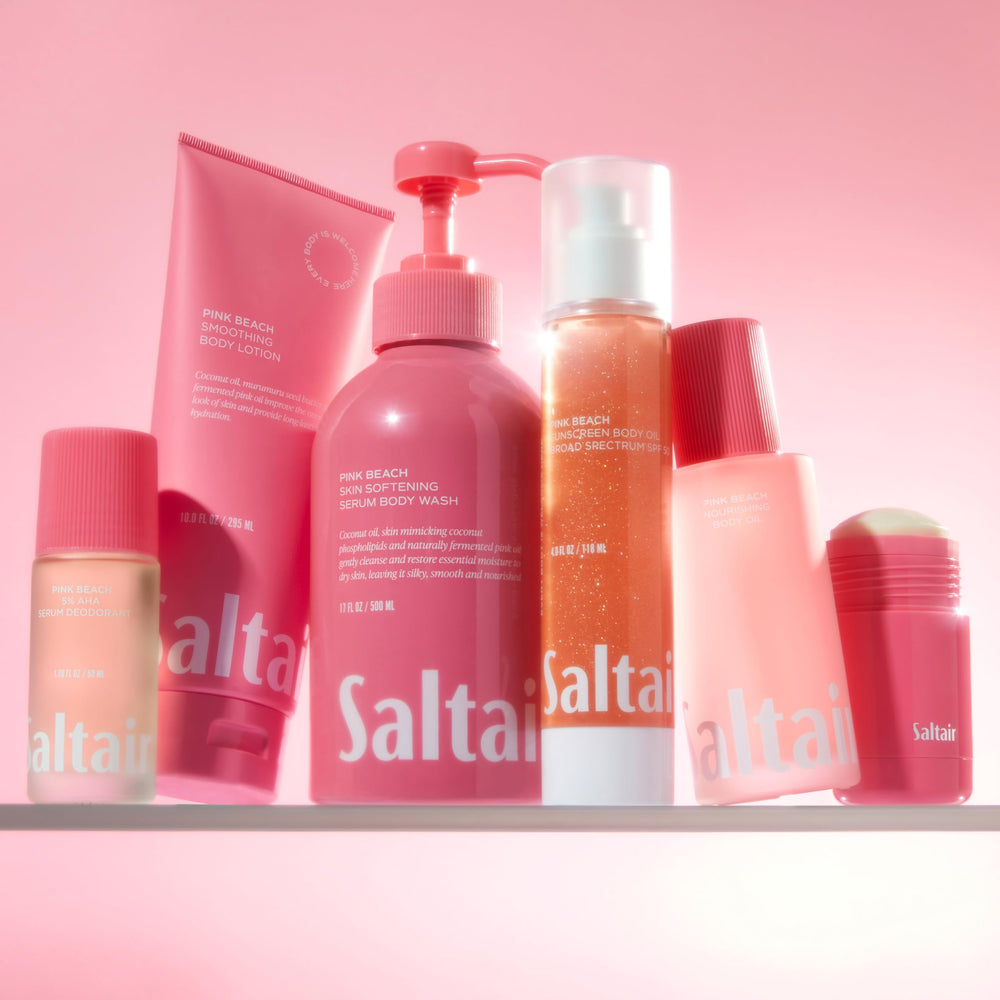 Saltair Pink Beach Lotion packaging closeup featuring vegan and paraben-free formula.