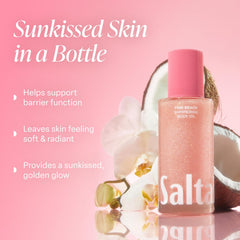 Saltair Shimmering Body Oil pink beach glow after application.